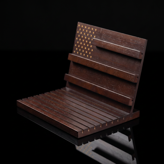 47VAULT Heritage Coin Display, angled detail on black showing the slotted three rail coin rack