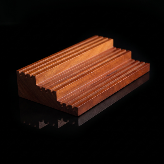 47VAULT Tiered Coin Display Gallery Edition, angled detail on black showing the three tier slotted stand
