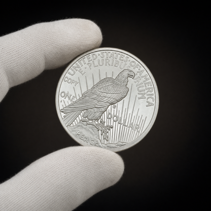 Liberty 1921 Coin Lustre Edition held in a white cotton conservator glove, reverse toward the camera with the COPY mark visible