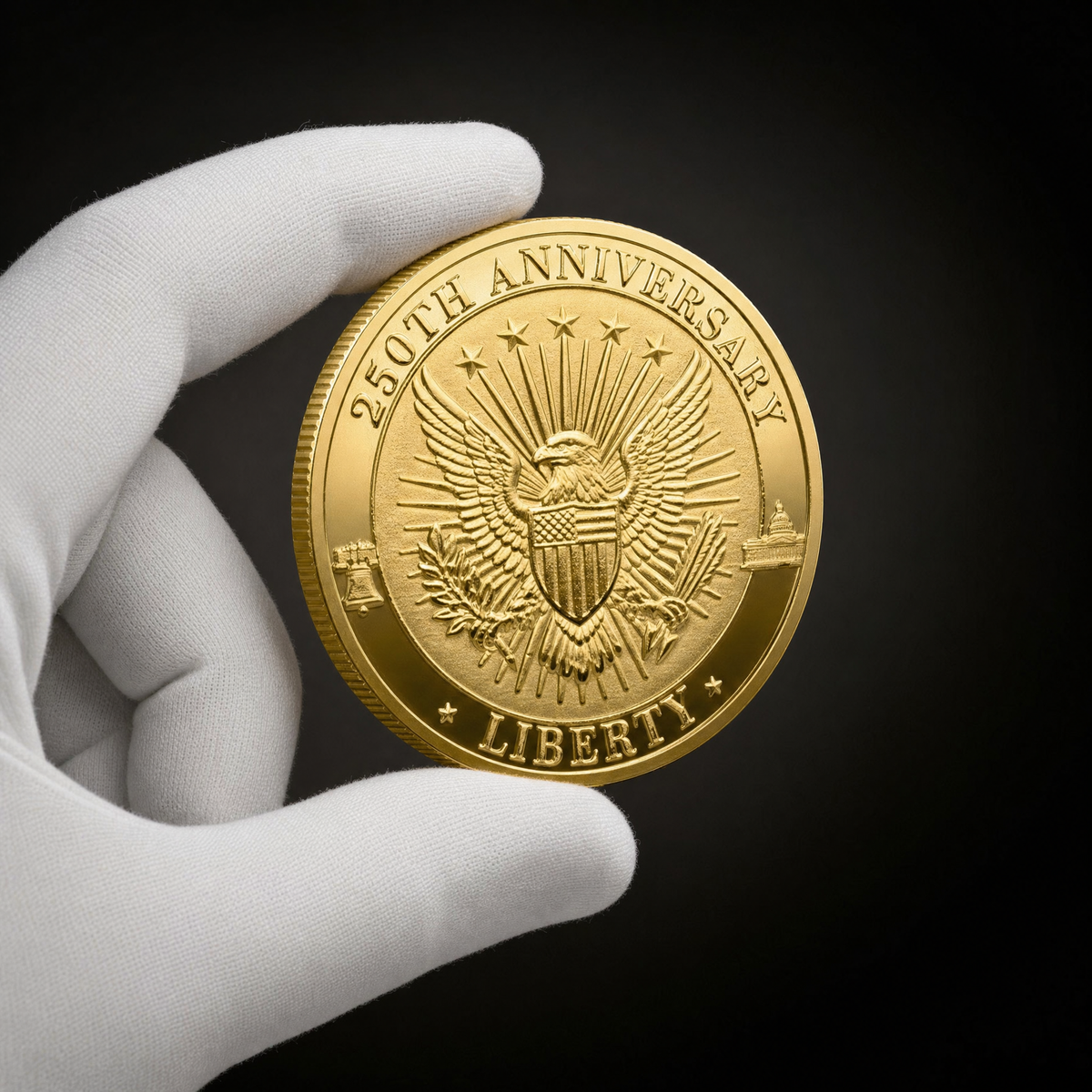Liberty 250 Coin Independence Edition held in a white cotton conservator glove, reverse toward the camera