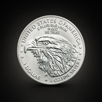 Liberty 2026 Coin Lustre Edition, reverse, an eagle head with UNITED STATES OF AMERICA above and the struck legends 1 DOLLAR and 1 OZ. FINE SILVER across the foot, reproduced as they appear on the piece