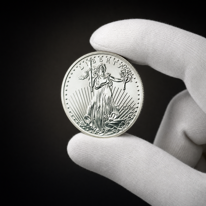 Liberty 2026 Coin Lustre Edition held in a white cotton conservator glove, obverse toward the camera