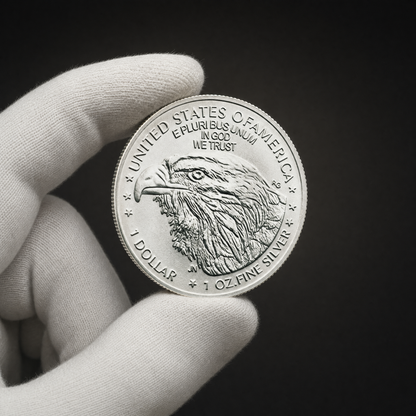 Liberty 2026 Coin Lustre Edition held in a white cotton conservator glove, reverse toward the camera